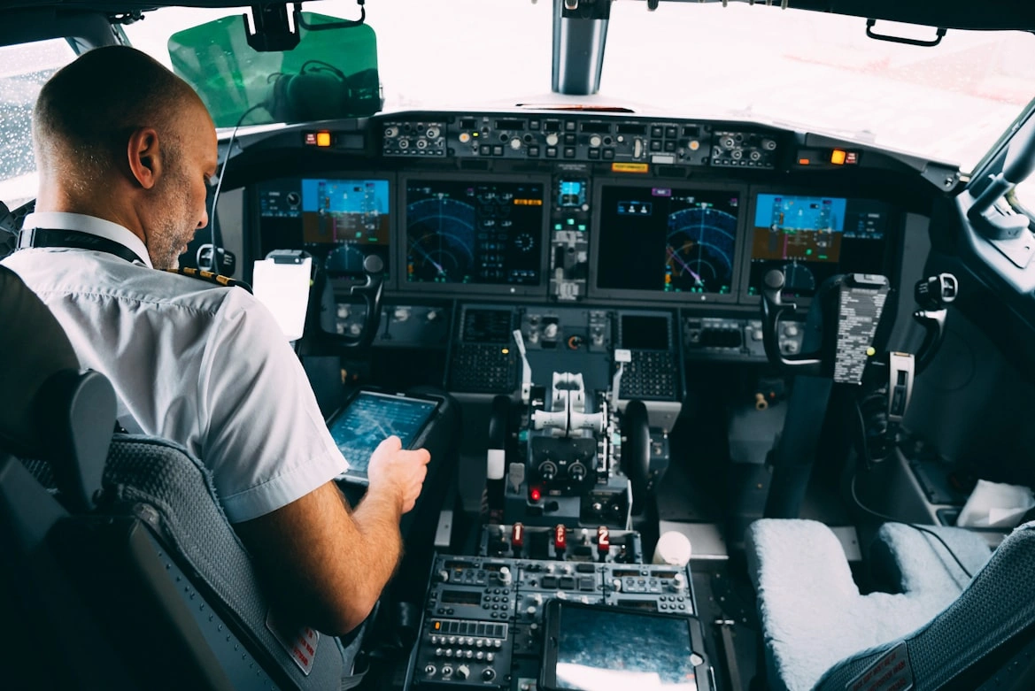 a-pilot-in-airplane-cockpit-preflight-checklist-ICAO-international