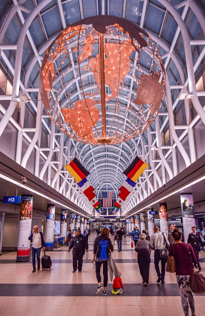 chicago o'hare international airport terminal with globe and flags decorations