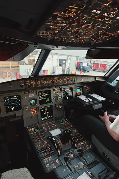 close up of airplane cockpit panel with illuminated controls showcasing aviation technology