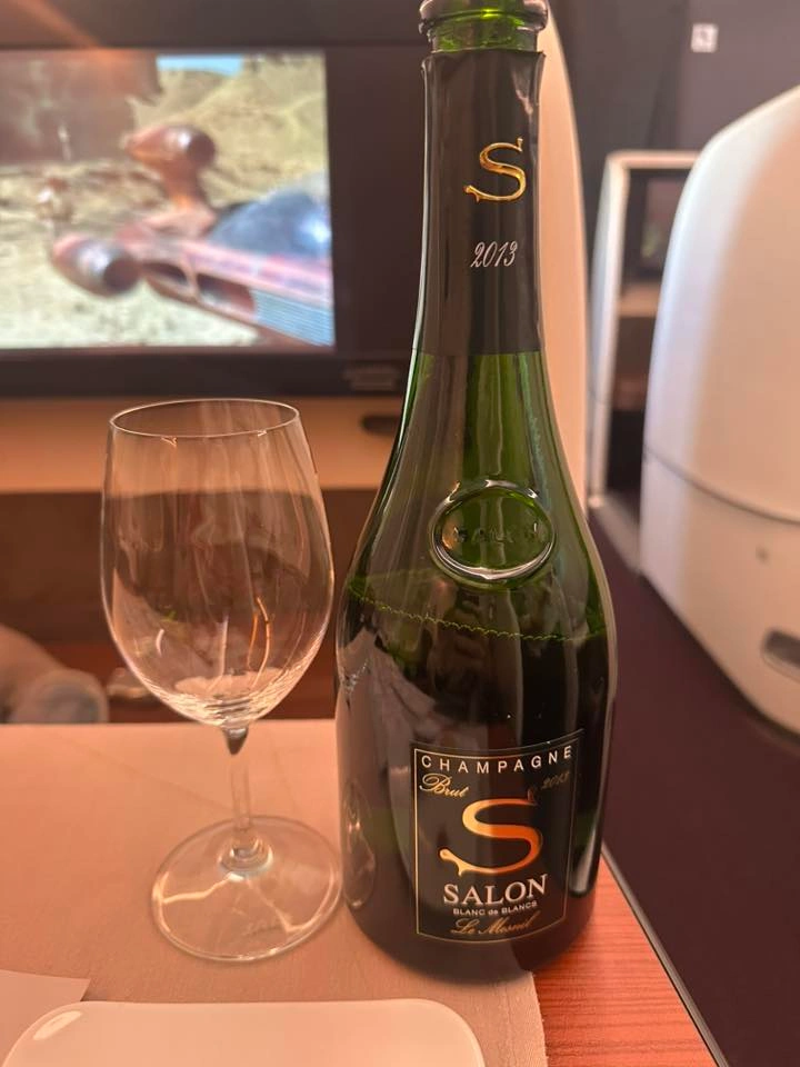 jal first class serves salon cuvee champagne JFK to Tokyo