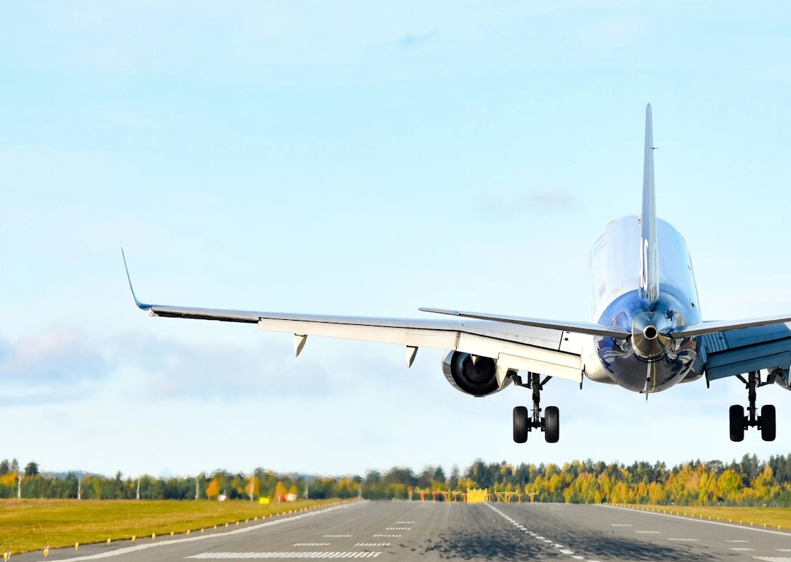 Large wide-body airplane taking off an airport wake turbulence