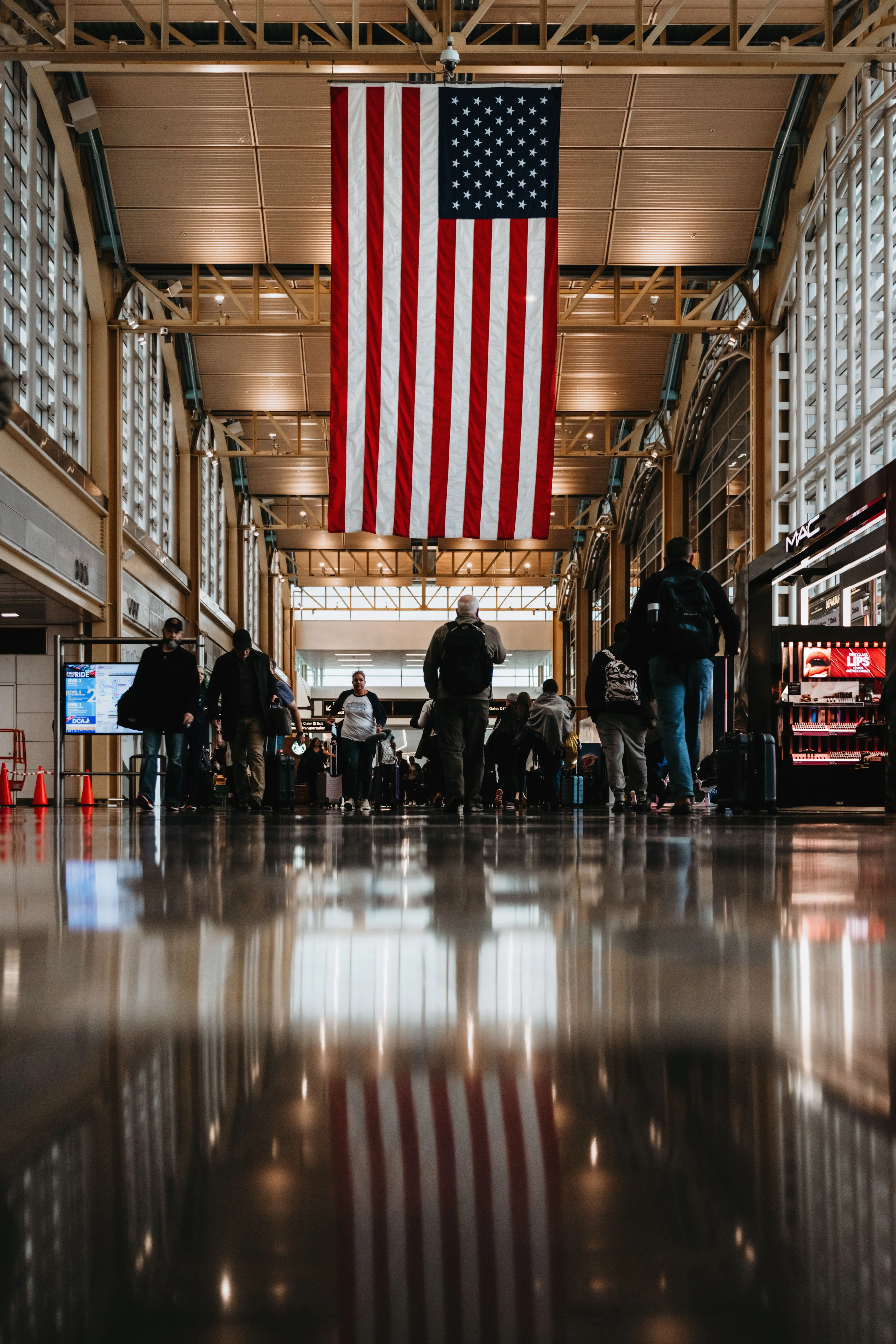 Busy US airport terminal during peak summer travel season for World Cup 2026