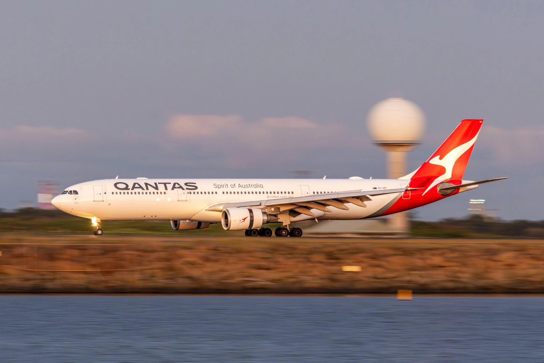 Qantas A330 300 on runway 34L at sydney airport