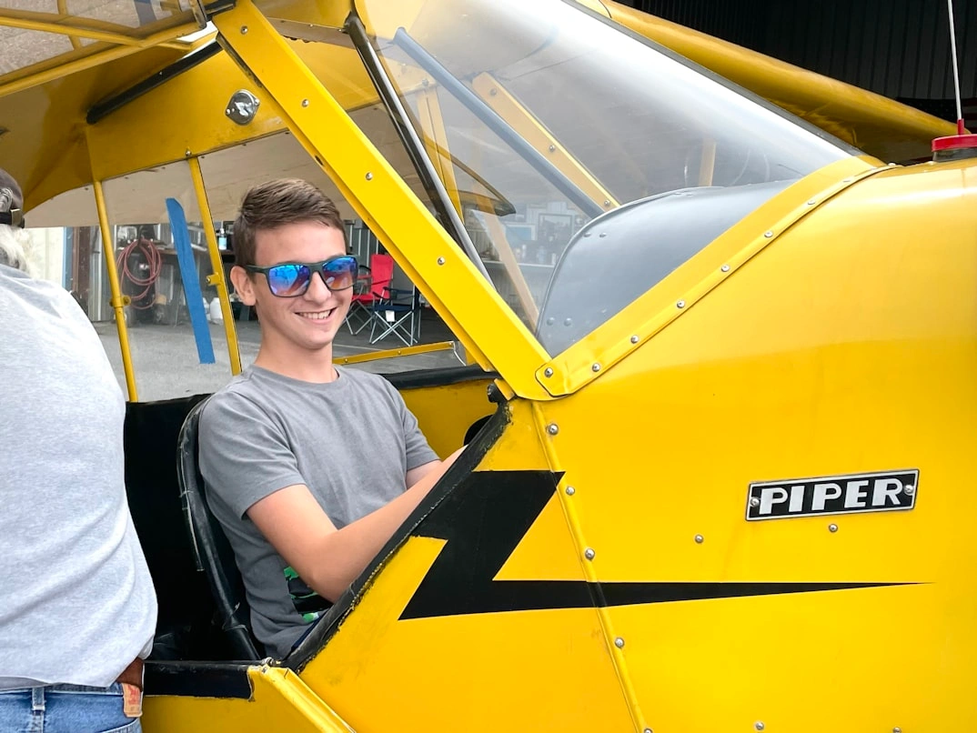 student pilot training in cockpit for pilot private license