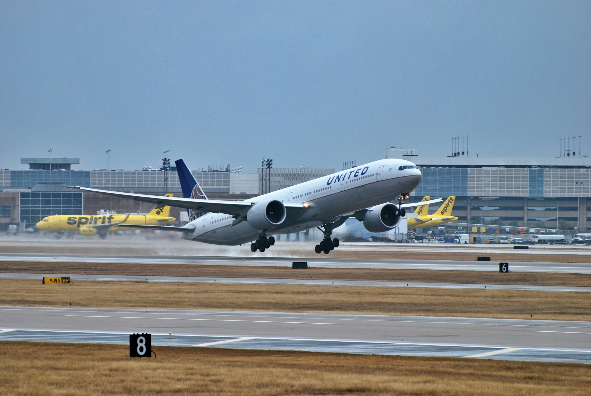 united airlines 777-322 taking off from the runway 